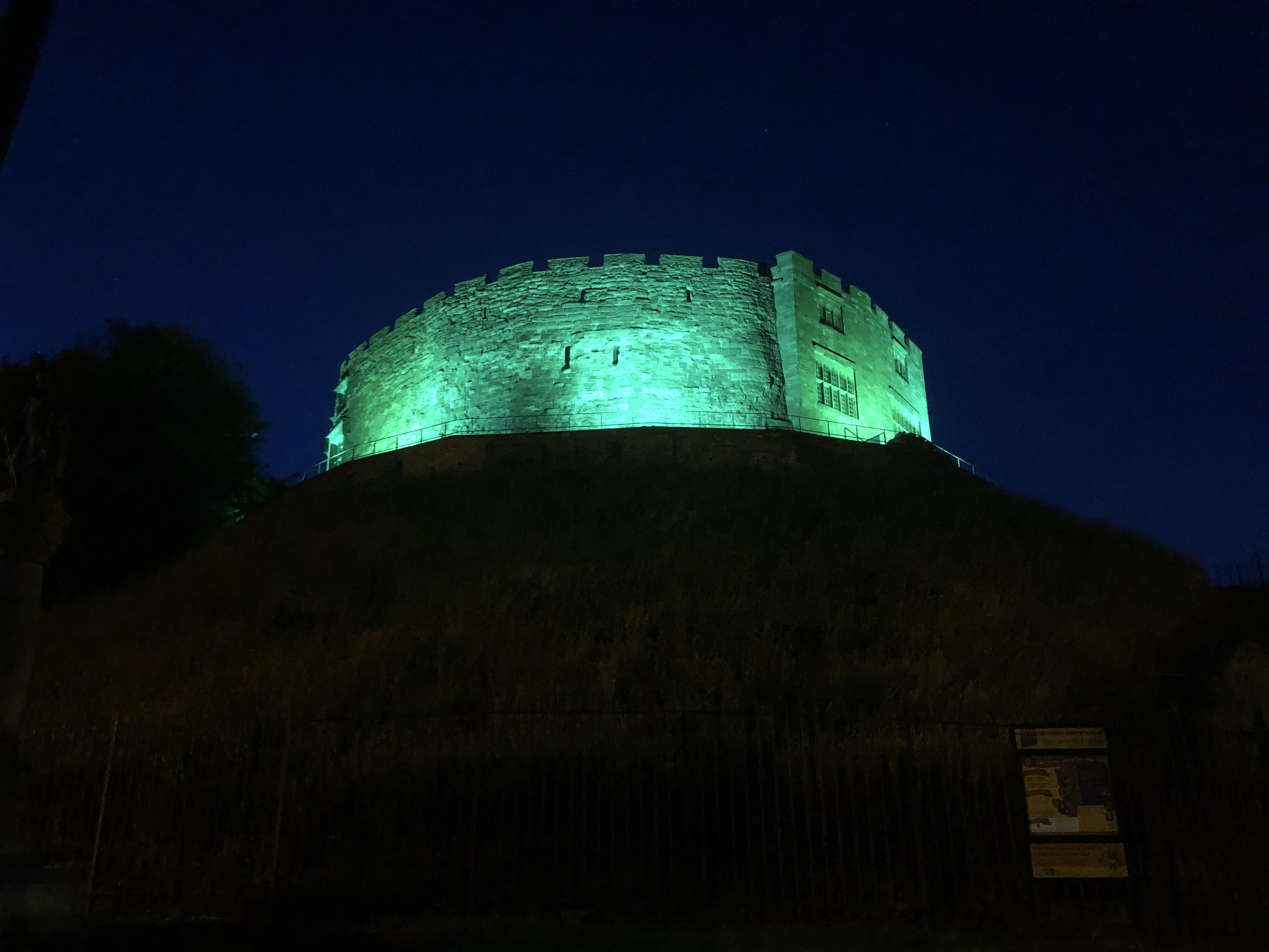 image of the castle lit-up green