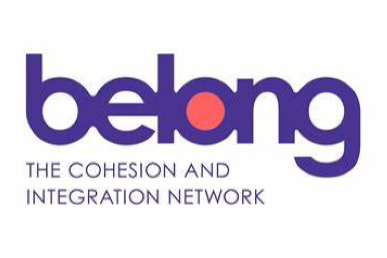purple 'belong network' logo
