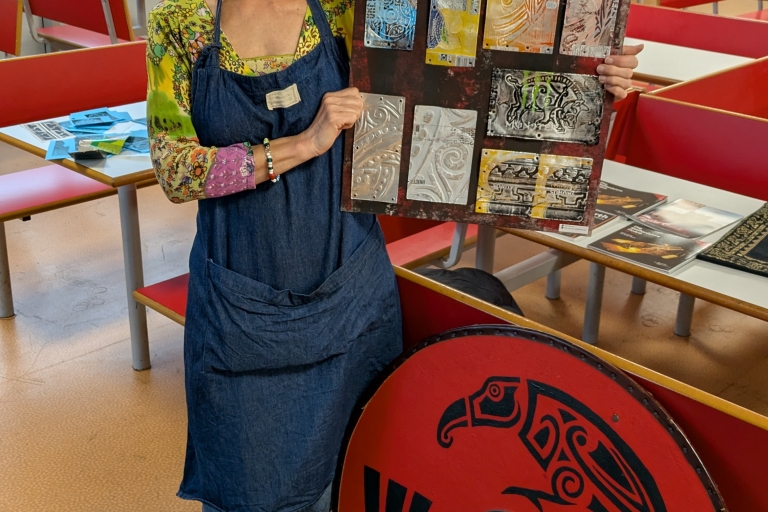 image of a crown template and a teacher holding artwork in a classroom