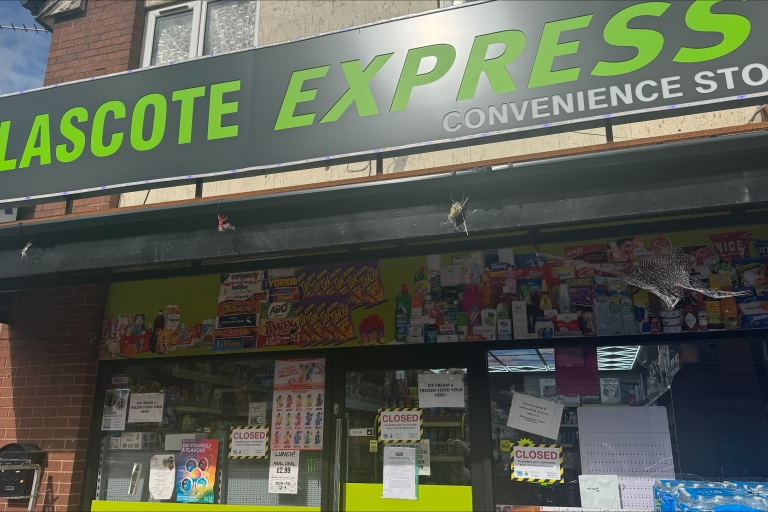 The front of a shop in Tamworth called 'Glascote Express' with closure notices on the windows