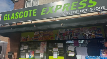 The front of a shop in Tamworth called 'Glascote Express' with closure notices on the windows