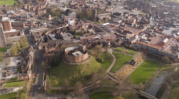 image of a birds eye view of a town centre with a castle